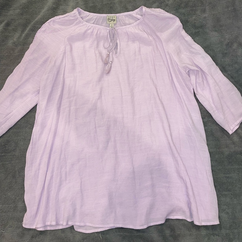 Lavender blouse.